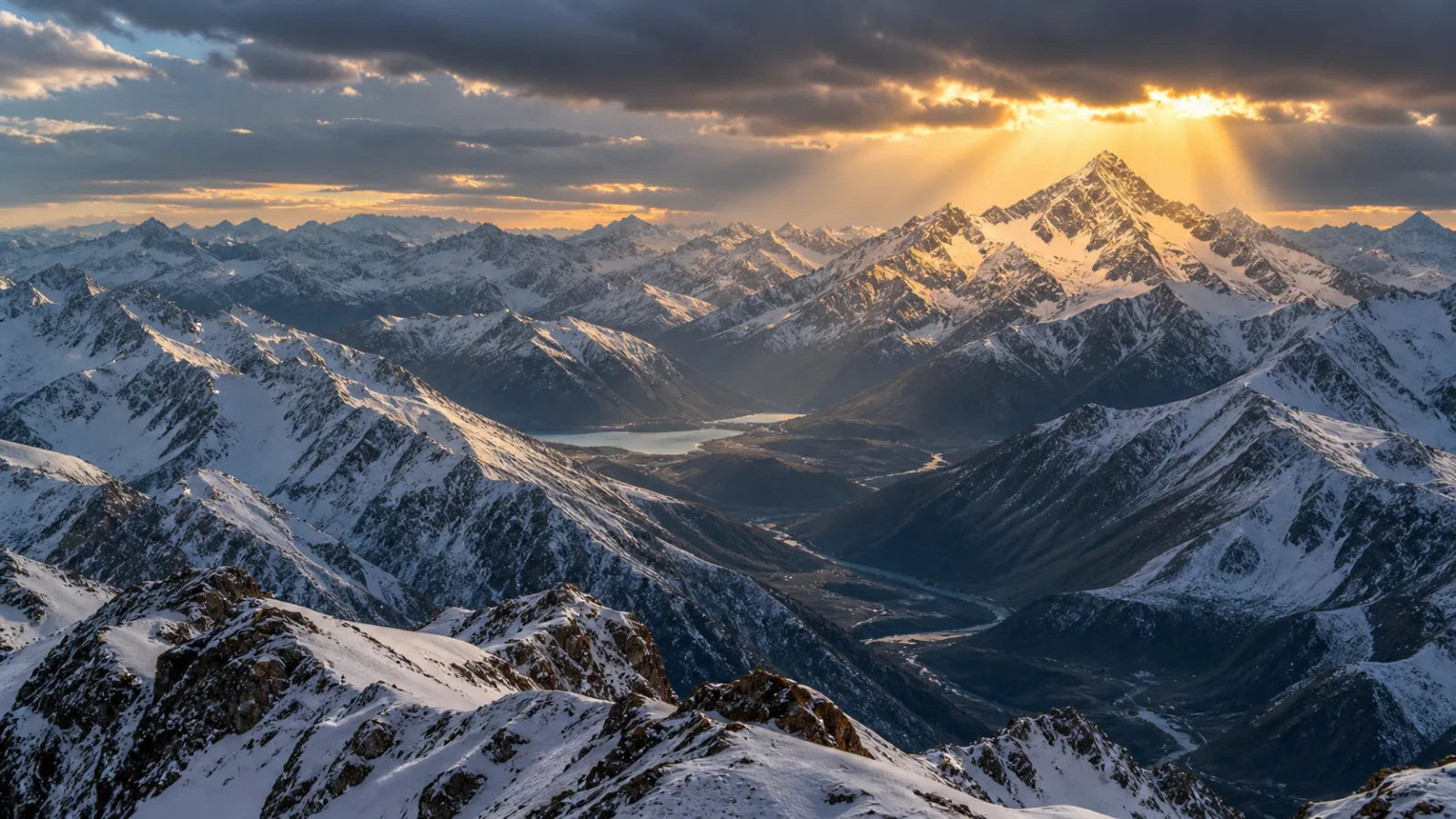 Panoramic view of a mountain range in eastern Turkey with one peak lit by breaking sunlight
