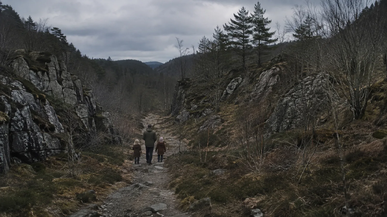 Illustrative reenactment of a father and two young daughters hiking along a rocky wooded ravine trail in Norway